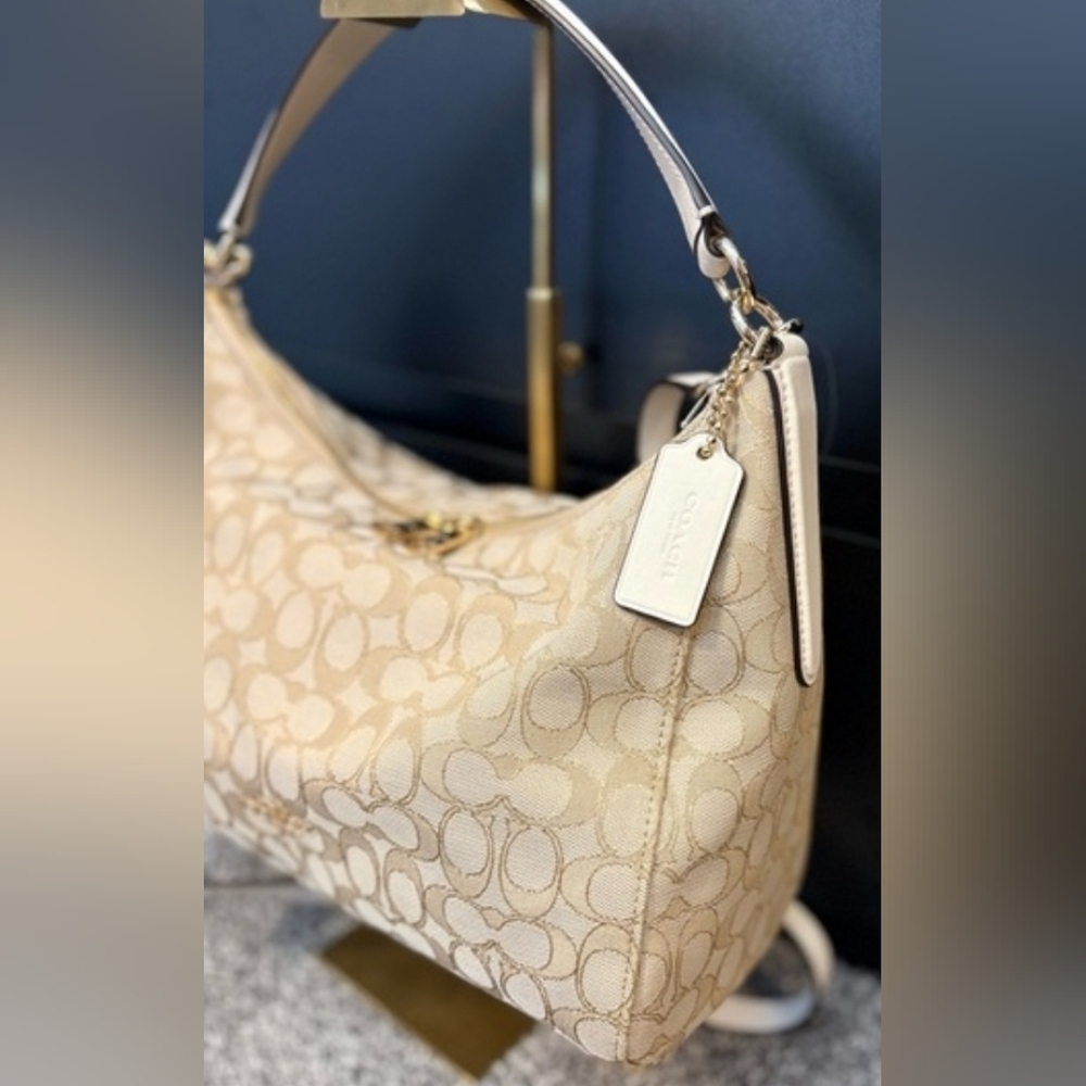 Great condition! Unique Coach Beige Signature Canvas Bag with White Strap. - Picture 9 of 13